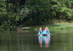 People paddle boating at Chadron State Park