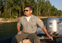 Park superintendent on a motorboat