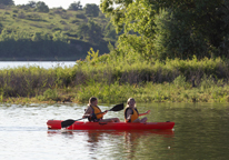 Two girls kayaking at Red Willow State Recreation Area