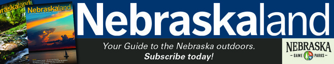 Ad for Nebraskaland Magazine showing sunset and boat, with text "Subscribe today!"