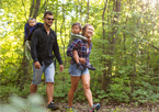 Family hiking on a wooded trail