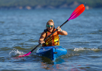 Woman kayaking in the Crofton's Dam Race