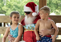 Santa with kids on his lap at Campfire Christmas event at Indian Cave State Park