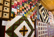 Quilts on display at Arbor Lodge State Historical Park