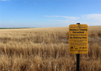 Nebraska land with a public access sign on it