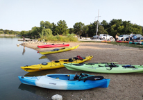 Kayaks waiting to be launched from Holmes Lake in Lincoln.