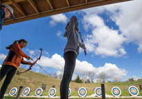 Students take aim at archery targets