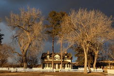 View of the officer's quarters at Fort Hartsuff at golden hour.