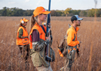 Group of hunters in the field