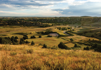 View of trees and plains from a trail at Ash Hollow State Historical Park