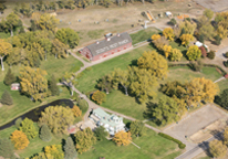 Aerial view of Buffalo Bill State Historical Park showing fall color, buildings and barn roof