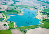 An aerial view of the lake at Danish Alps State Recreation Area