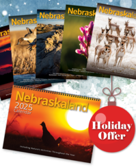 Spread of Nebraskaland covers with the 2025 calendar on a snowy background