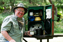 Dick Turpin posing with an array of outdoor gear