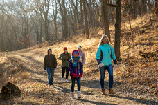 People hiking in winter at Ponca State Park