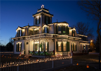 Buffalo Bill's mansion lit up for Christmas