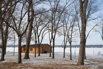 Snowy cabin by the lake at Lewis and Clark State Recreation Area