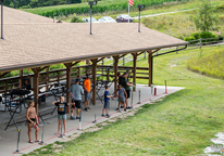 People at an outdoor shooting facility at Platte River State Park