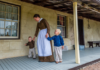 Reenactors walking the grounds of Fort Hartsuff