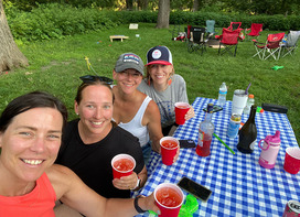 Friends at a campsite at Mahoney State Park