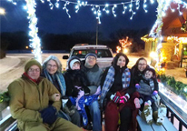 Riders on a holiday hayrack ride