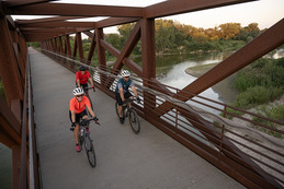 People bike on the Cowboy Trail