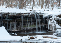 Waterfall at Platte River State Park in winter