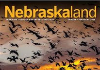 Nebraskaland's masthead with sandhill crane photo in background