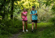 Two friends hiking on a Nebraska trail