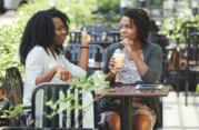 two women dining outdoors