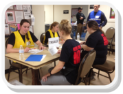 MRC volunteers triage “residents” at a Medical Needs Sheltering Exercise.