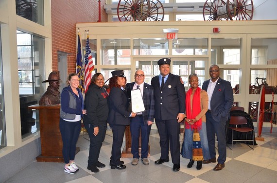 Mayor Gusciora, City Councilmembers, and Department of Fire and Emergency Services Director Kenneth Douglass appear with Karla and Solomon Townsend