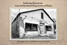 Postcard with black and white image of old adobe building