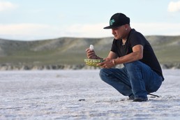 Moises Gonzales man kneeling