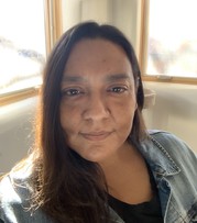 Patricia Perea, woman in front of sunny windo