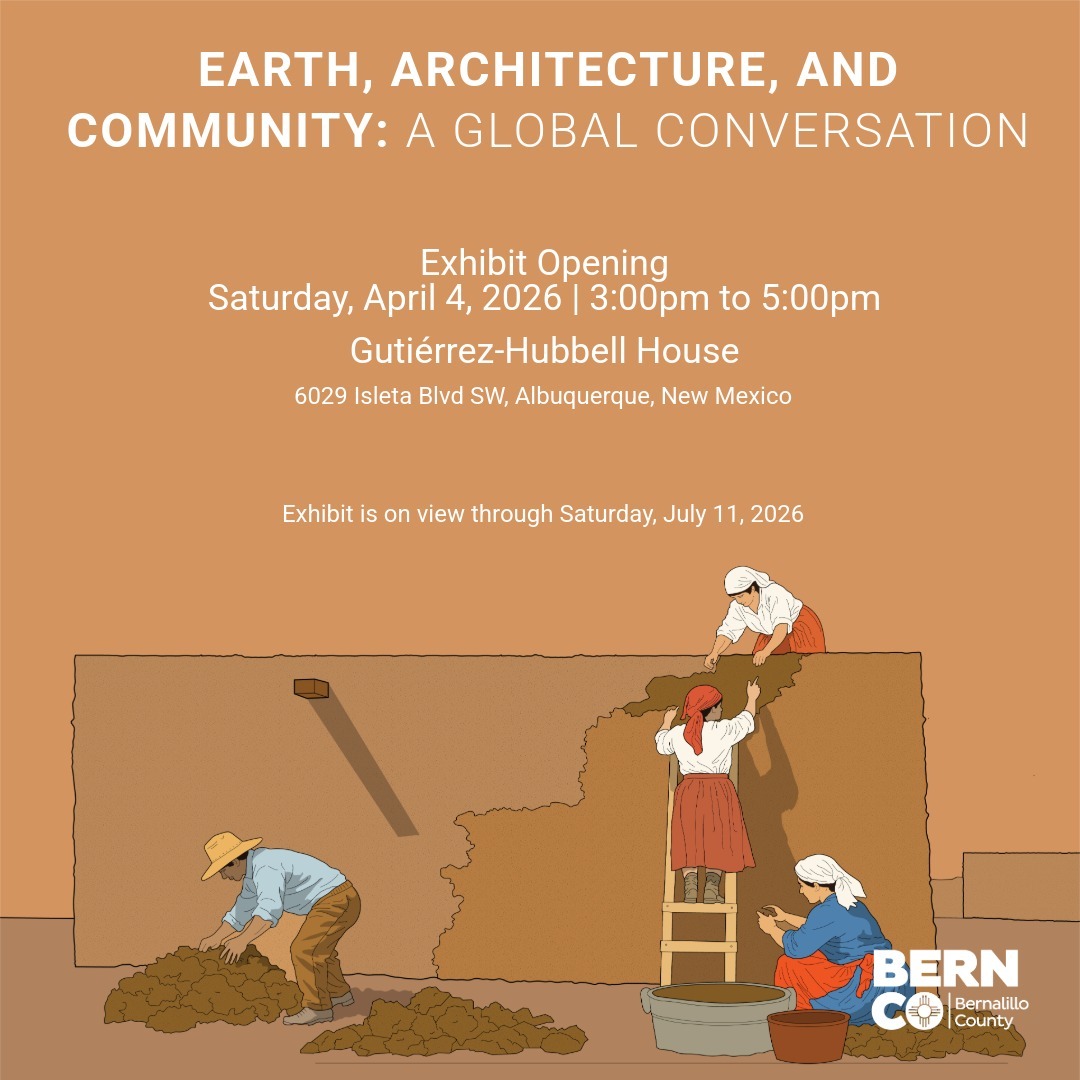 Four women and a man with ladder and tub plastering adobe wall with text for Earth, Architecture and Community Exhibit Opening