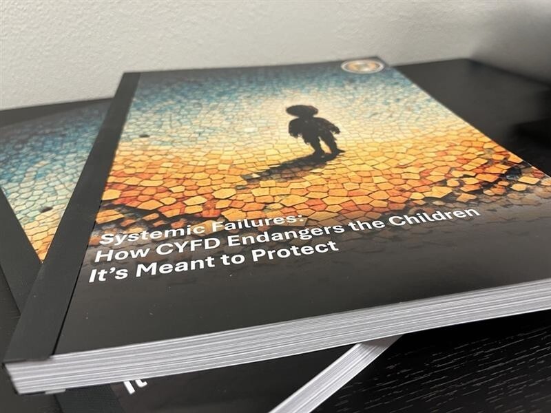 Printed report titled ‘Systemic Failures: How CYFD Endangers the Children It’s Meant to Protect.