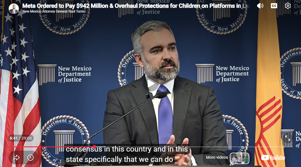 Attorney General Raúl Torrez speaks at a podium in front of a New Mexico Department of Justice backdrop.