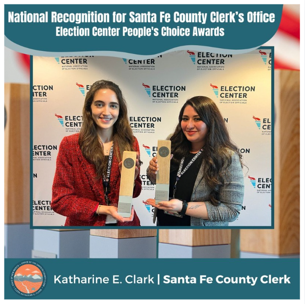 2 Clerk's Office staff members holding 2 People's Choice Awards