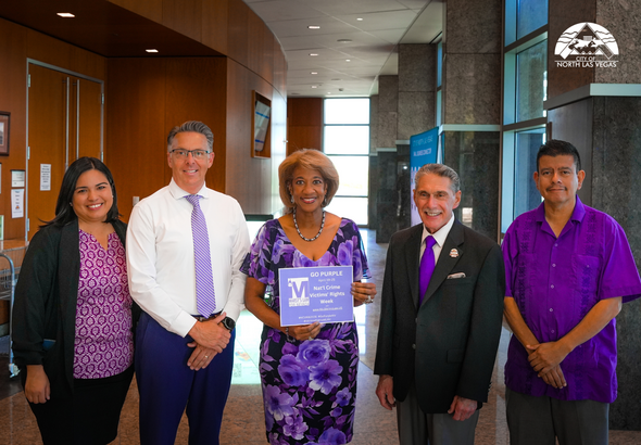 Mayor and Council wearing purple outside of council chambers