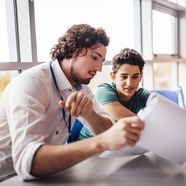 Youth Worker Looking at Working Papers