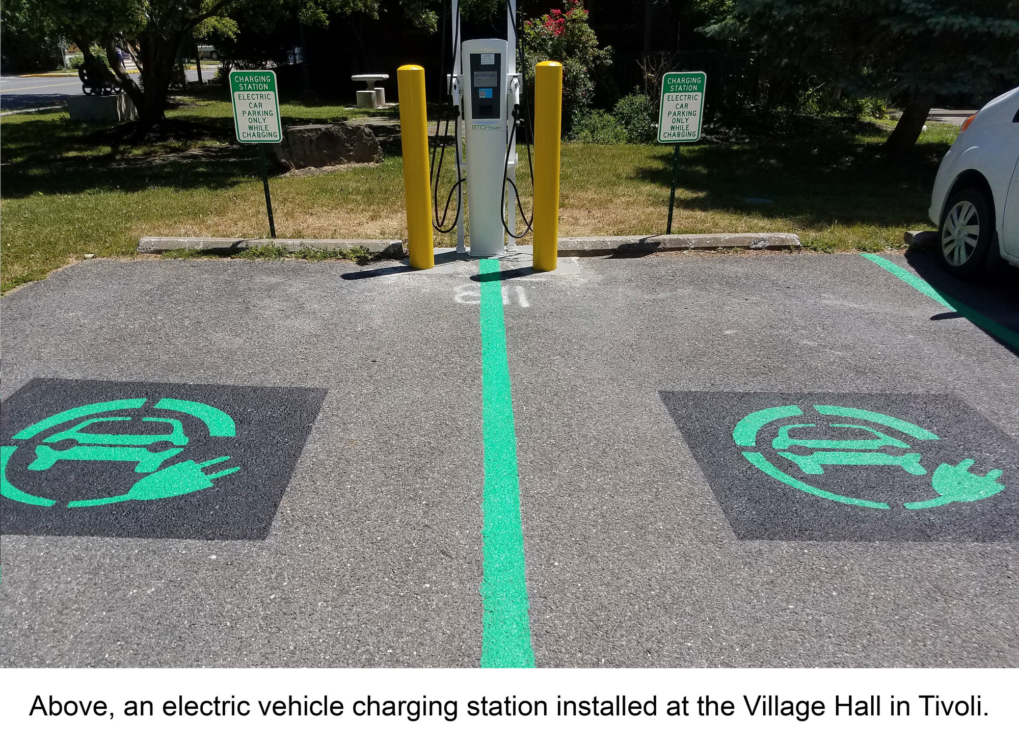 An electric vehicle charging station installed at the Village Hall in Tivoli.