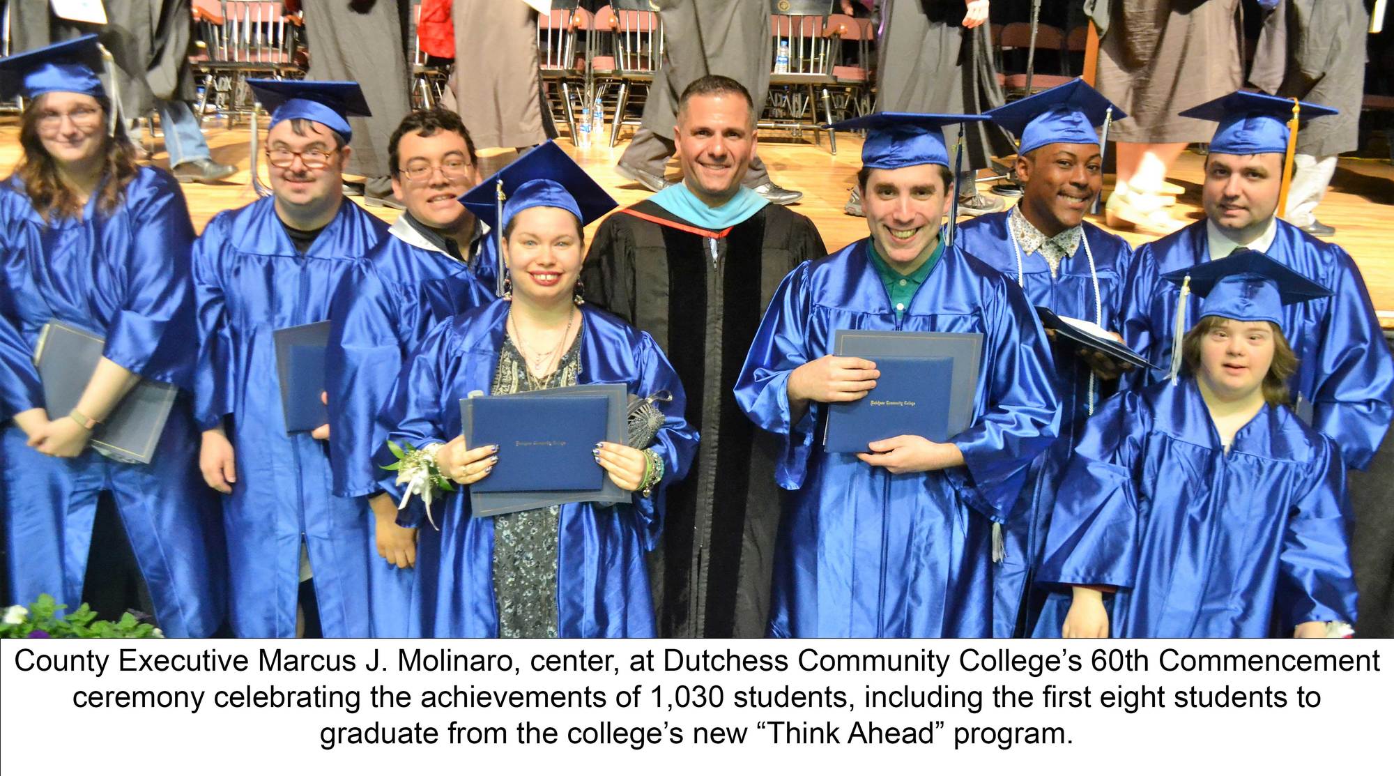 County Executive Molinaro at DCC’s Commencement ceremony with the first 8 graduates of the “Think Ahead” program.