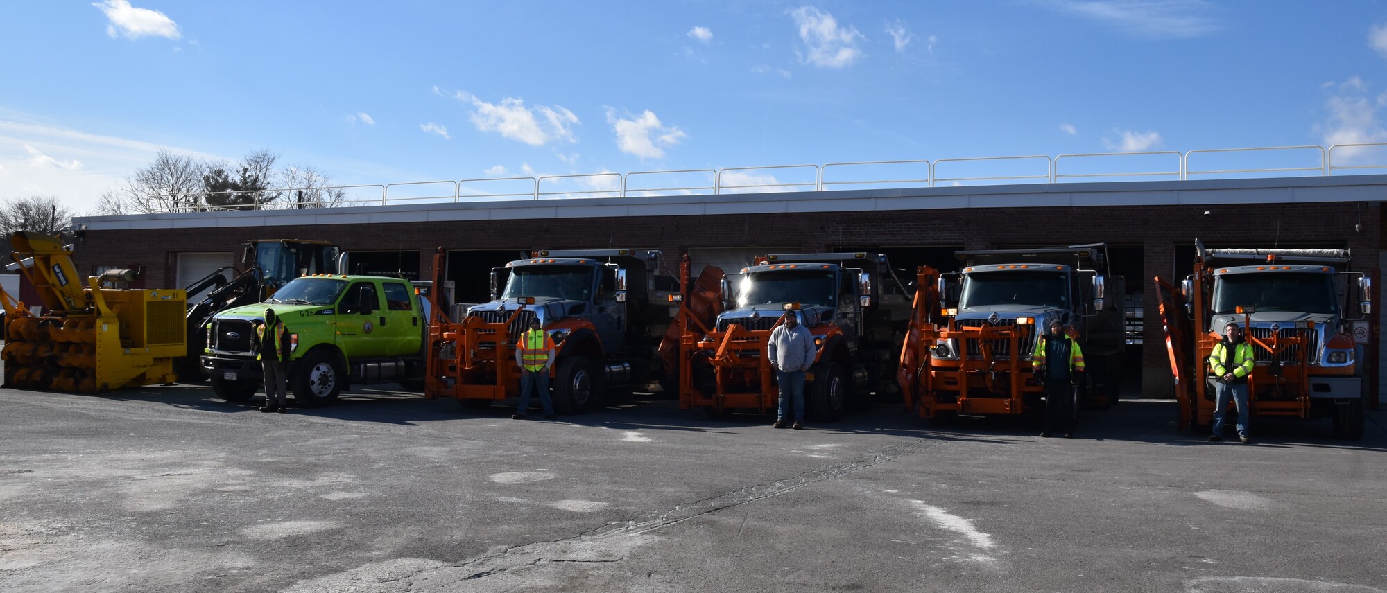 DPW Highway crew with their trucks