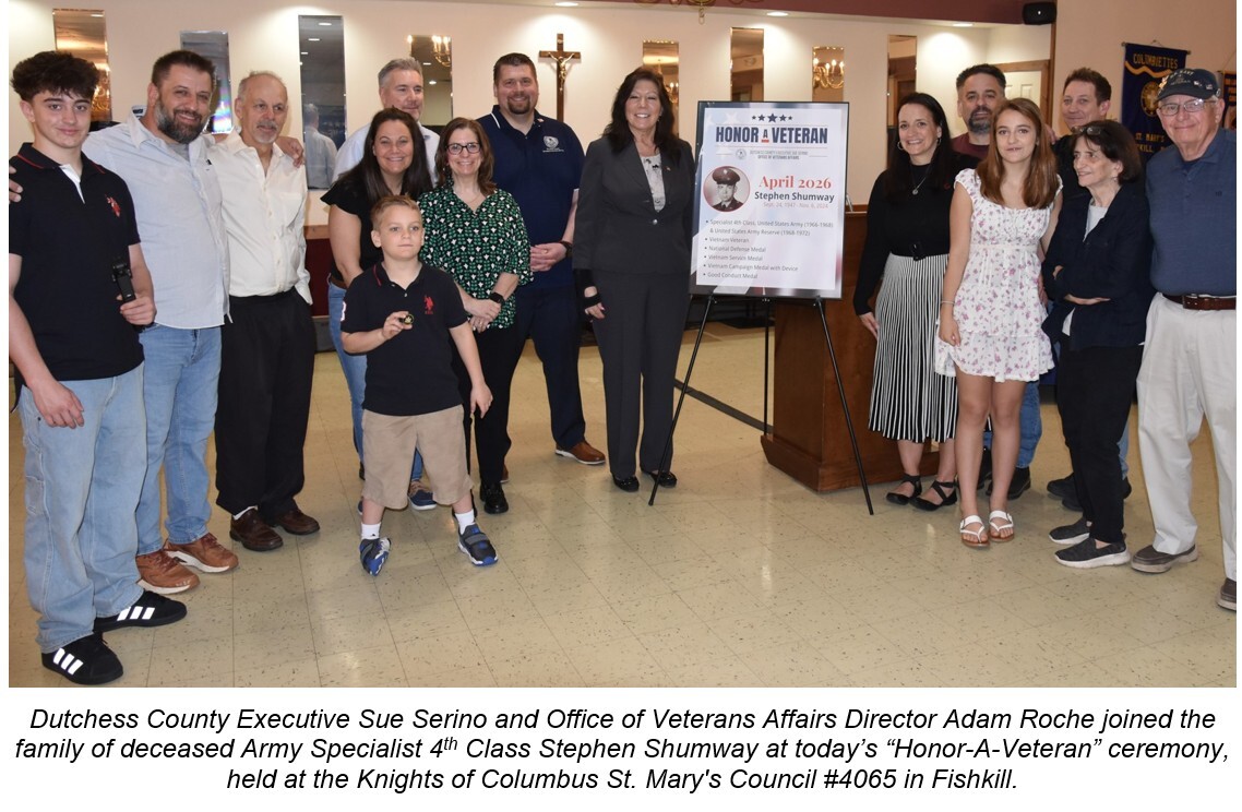 A photo of County Executive Serino and Veterans Affairs Director Roche with the Shumway family
