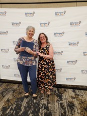 Phillis Maucieri accepts an award from RSVP