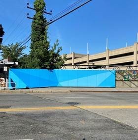 Blue wall at North Ave Bridge