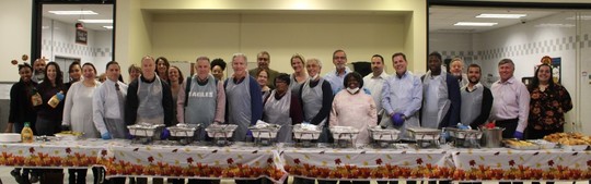 Volunteer group serving Thanksgiving Dinner