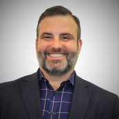 Headshot of Adam Salgado