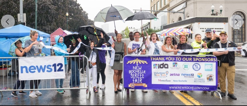 10th Annual Street Fair group shot ribbon cutting